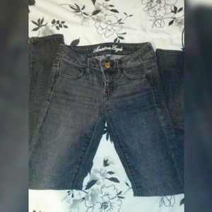 Grey american eagle skinny jeans.